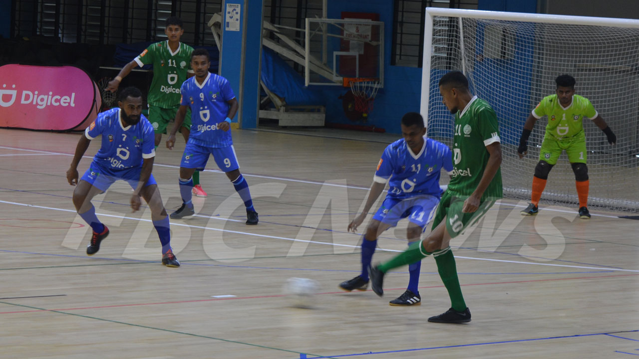 Quarter final penalty shoot-out in packed futsal stadium 